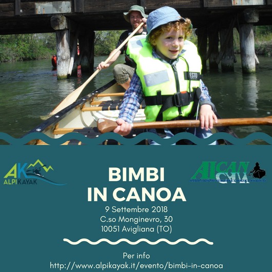 Bimbi in canoa